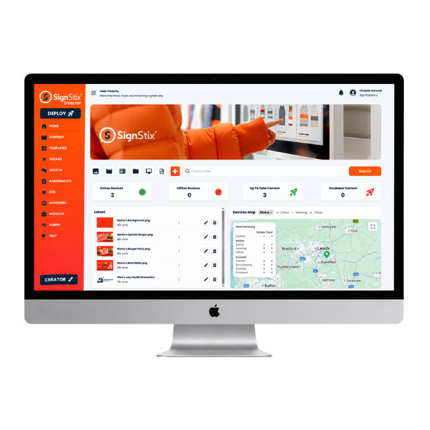 Desktop monitor with a bright orange screen on a white background