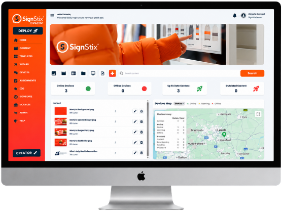 Desktop monitor showing a SignStix digital signage dashboard with an orange sidebar and analytics map.