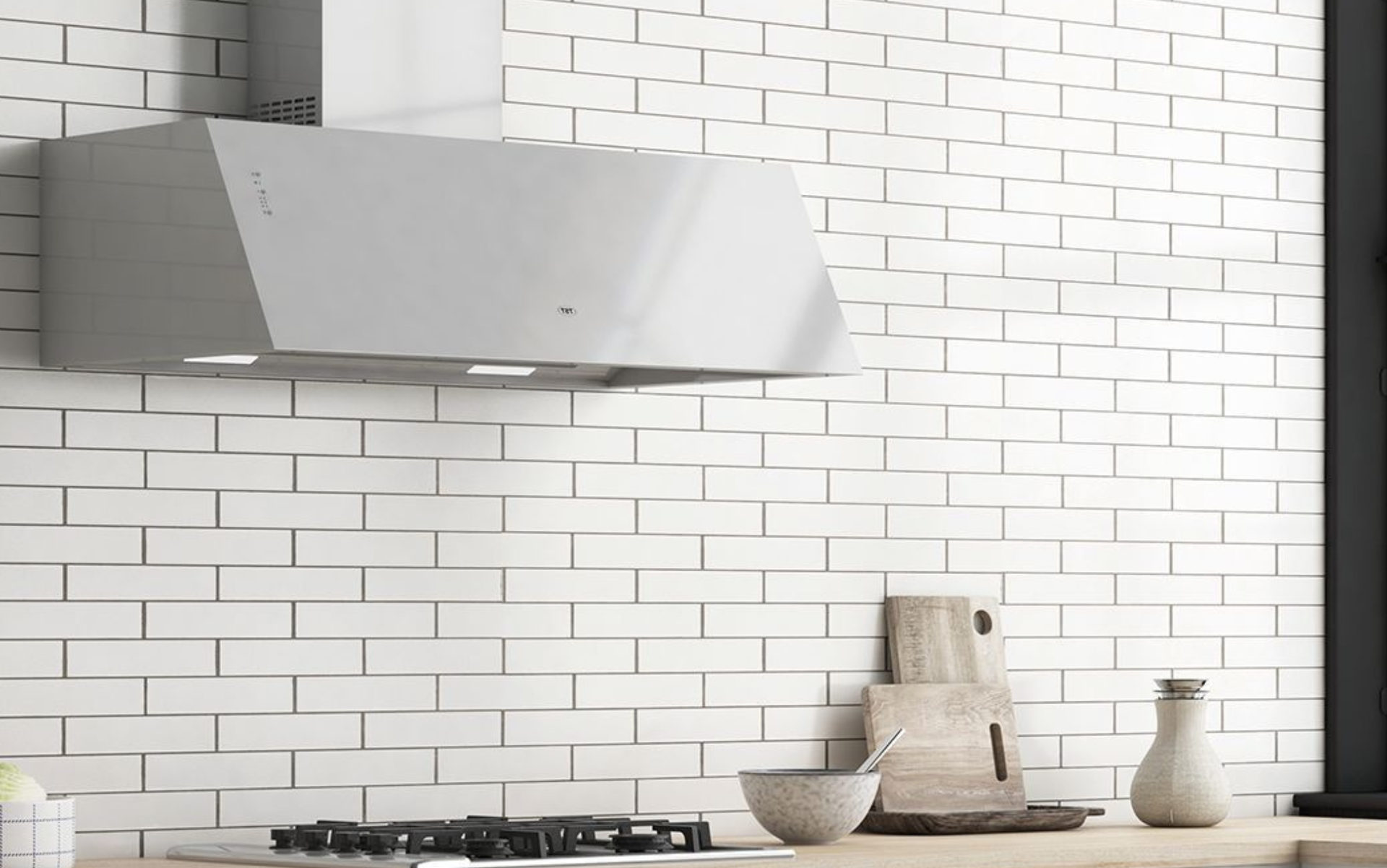 Cocina moderna con salpicadero de azulejos blancos tipo metro