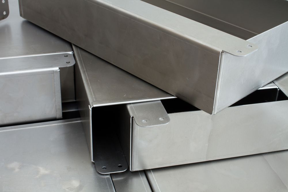 A Stack of Stainless Steel Boxes Sitting on Top of Each Other — Betts Welding Pty Ltd In Moss Vale, NSW