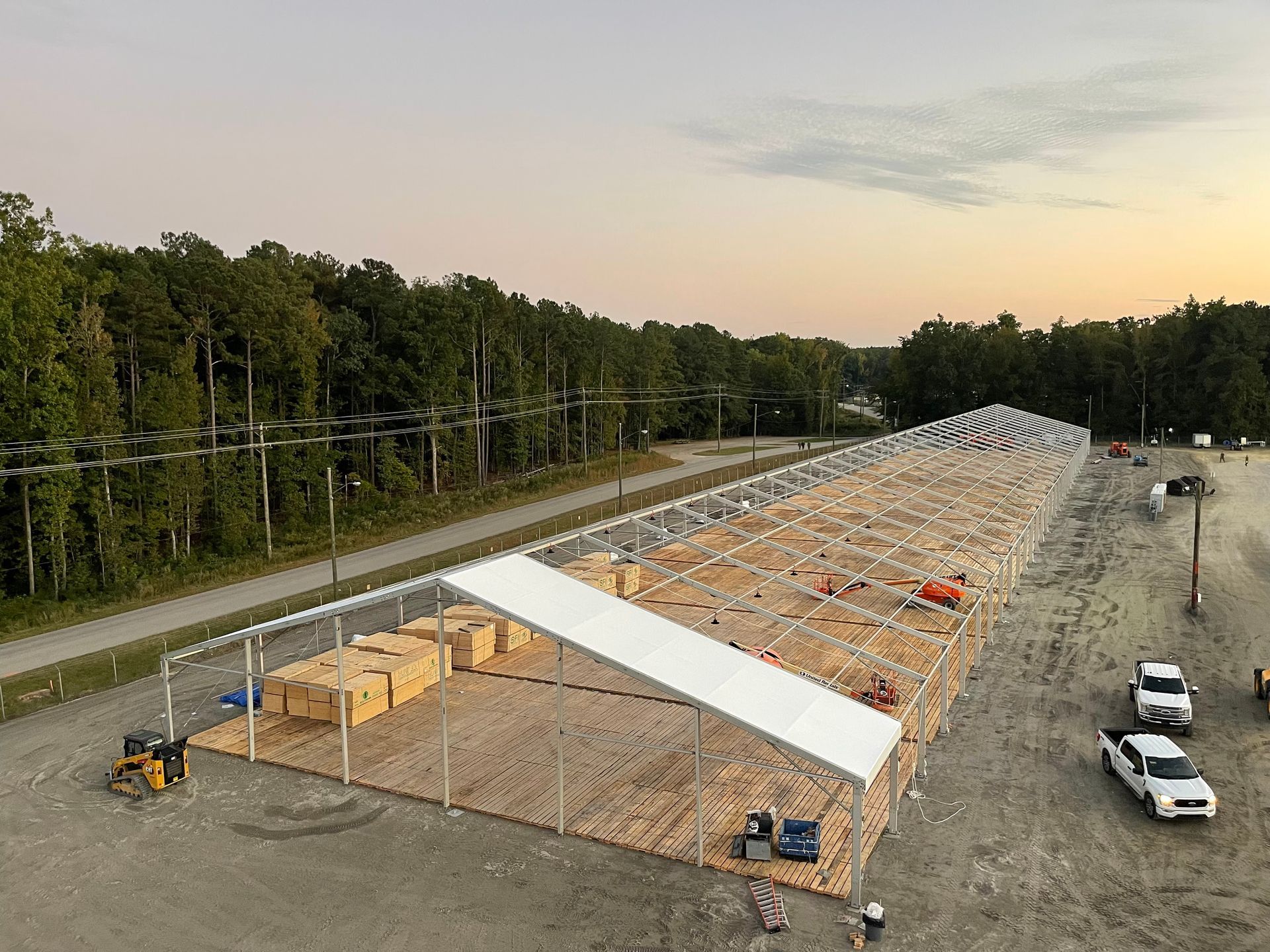 An aerial view of a large building under construction.