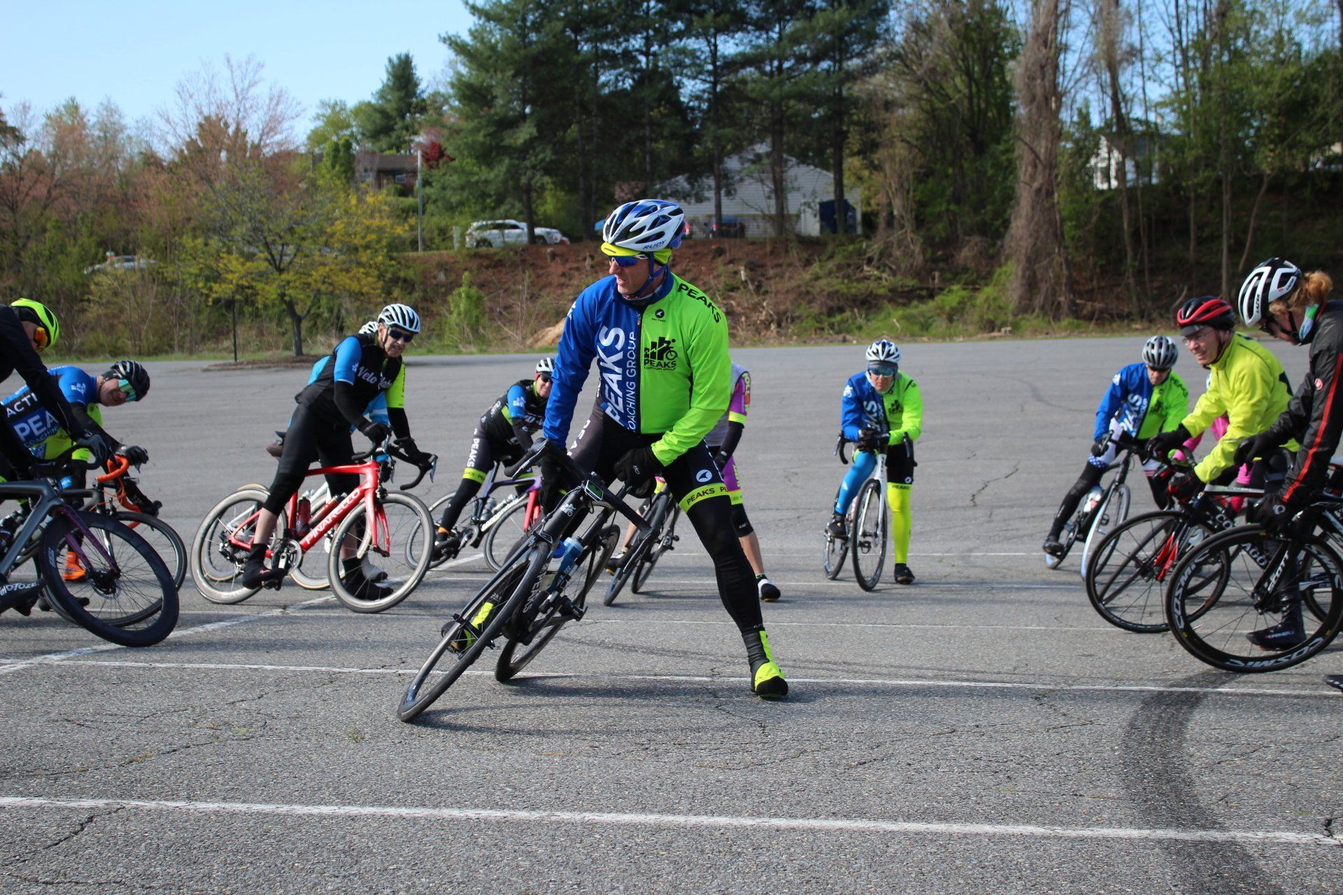 A group of people are riding bicycles on a road.
