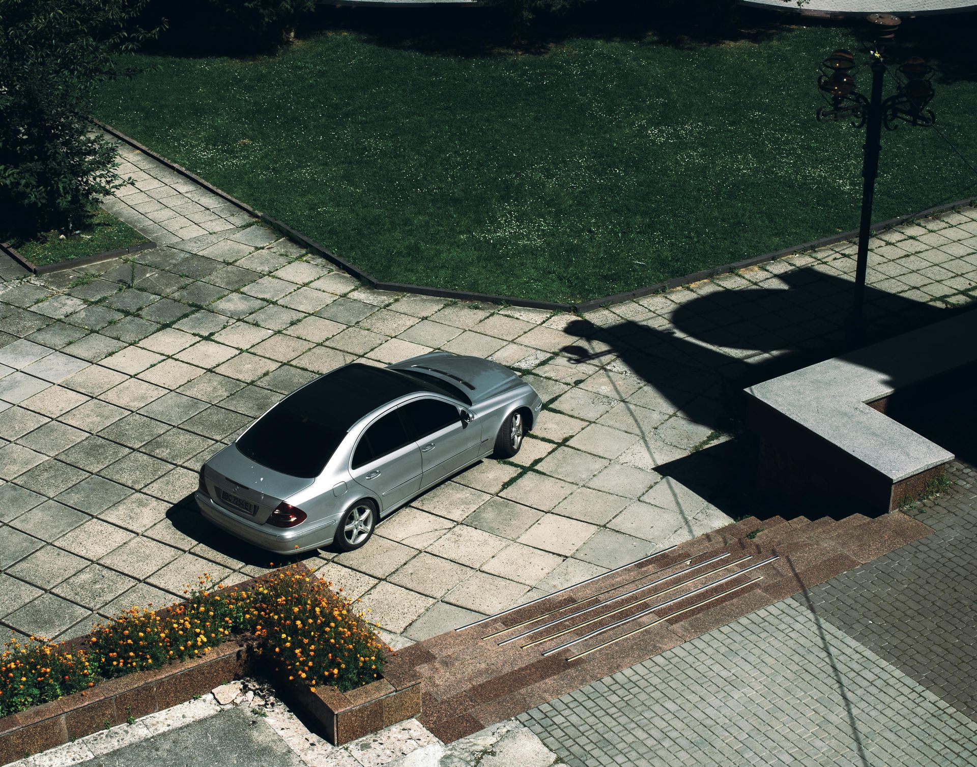 Concrete driveway repair after surface cracking and weather damage