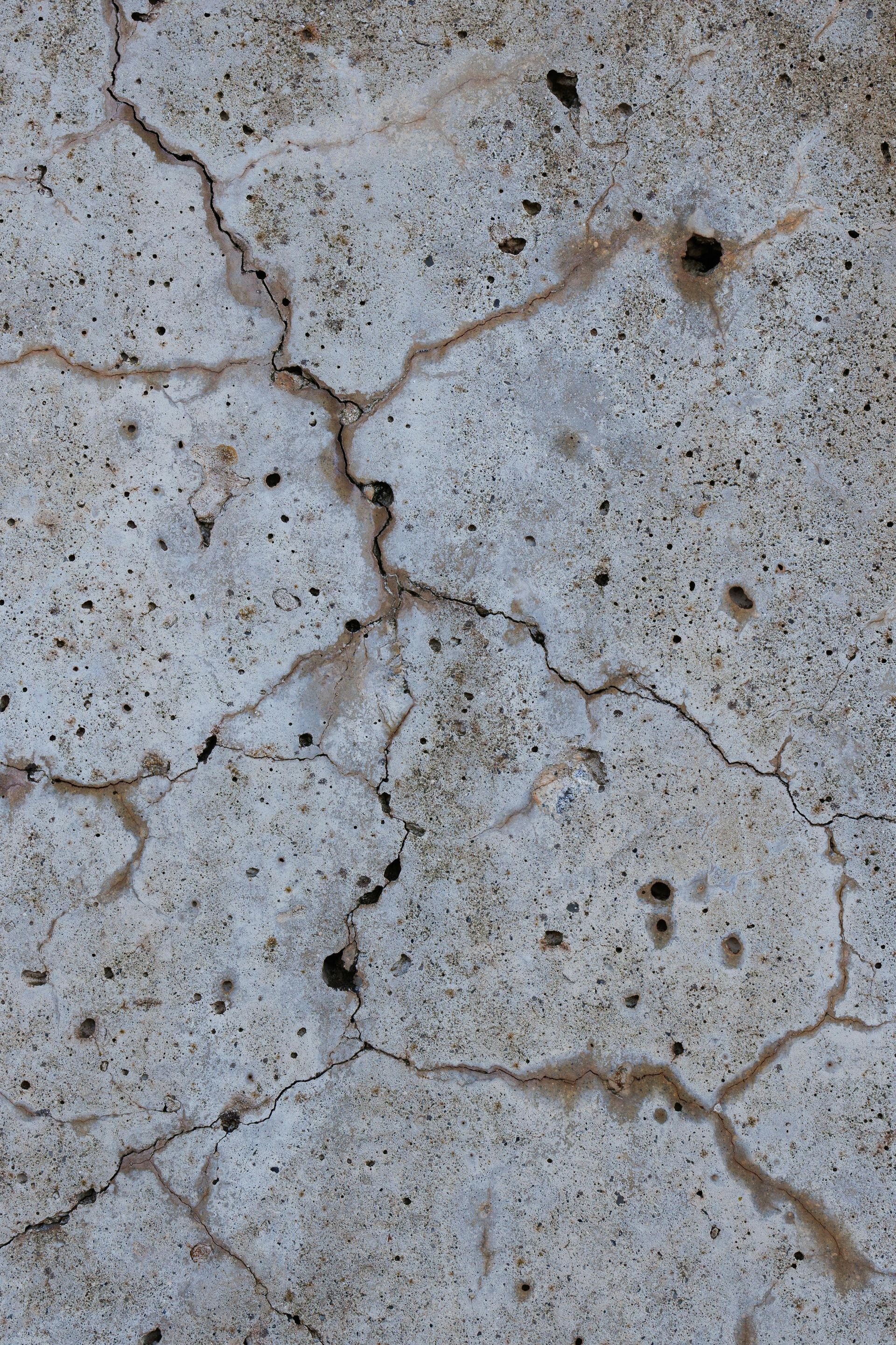 Foundation waterproofing work around residential property during rainy weather