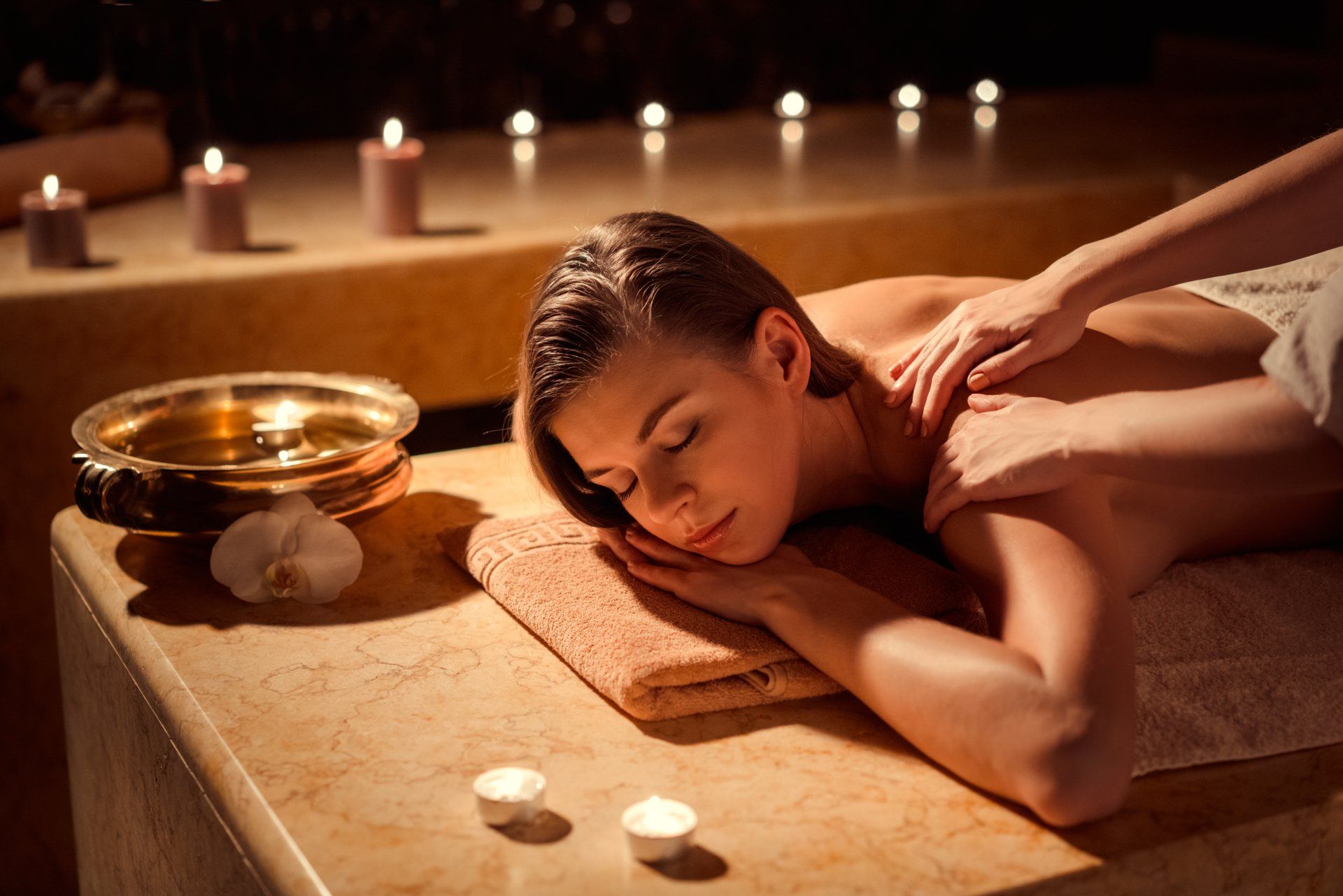 Young girl in spa massage