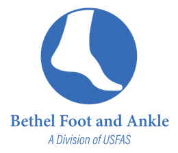 Blue circle with white foot silhouette; text: