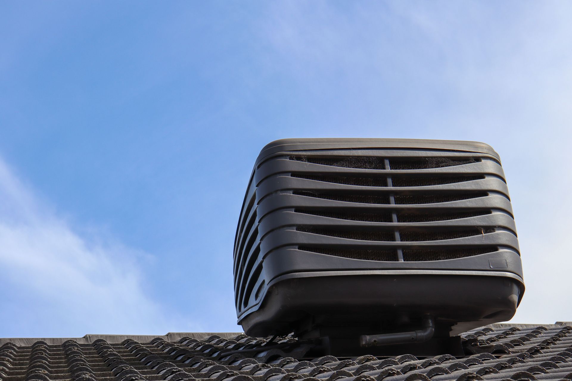 Evaporative air conditioning installation on an Adelaide home