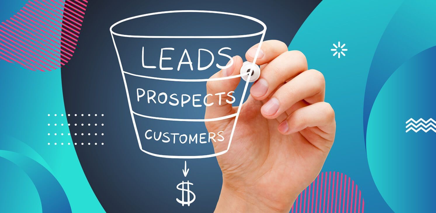 a hand is drawing a sales funnel with a marker .