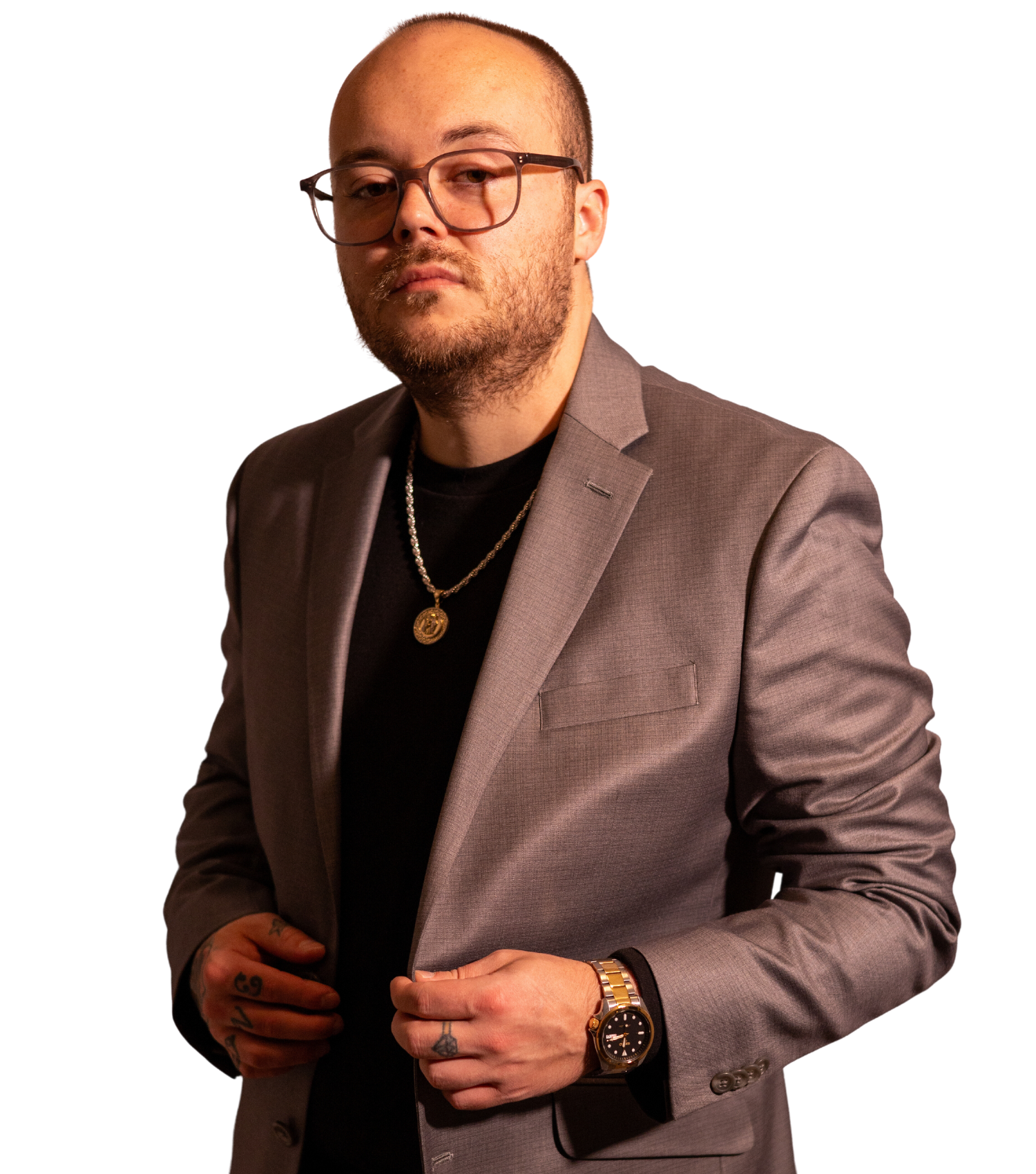 a man in a suit and glasses is adjusting his jacket .