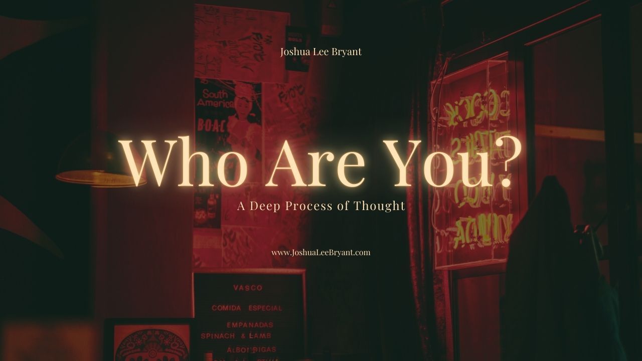 A dark room with a neon sign that says `` who are you ''.