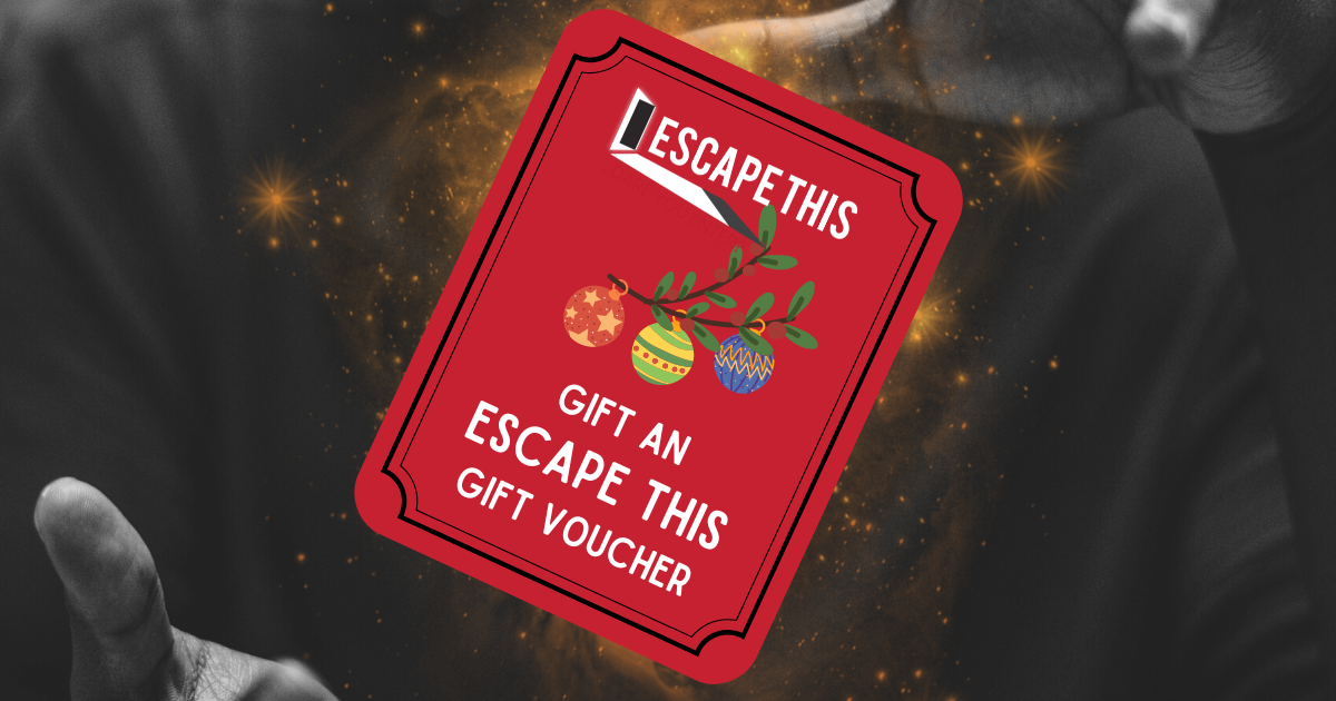 Man Holding an Escape Room Gift Card