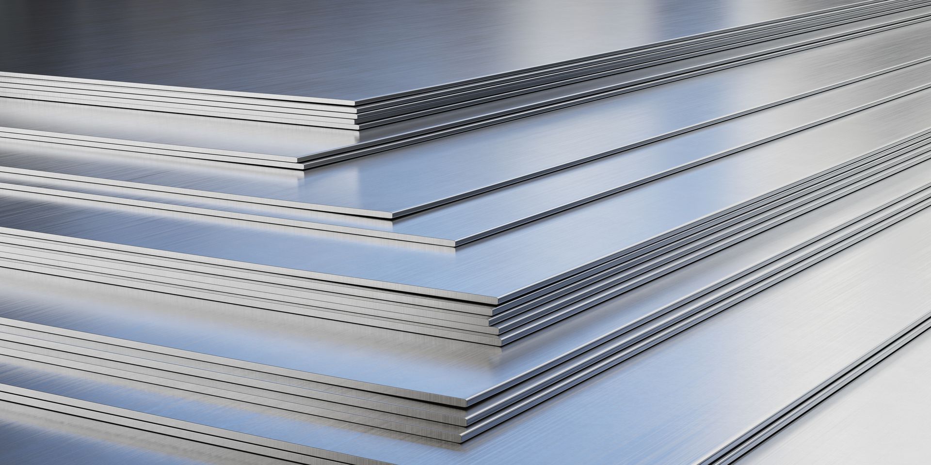 A Stack Of Metal Sheets Stacked On Top Of Each Other On A Table | Jefferson, NC | Sheets Brothers, Inc.