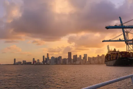 Golden sunset views during a Miami Sunset Cruise seen directly from the boat.
