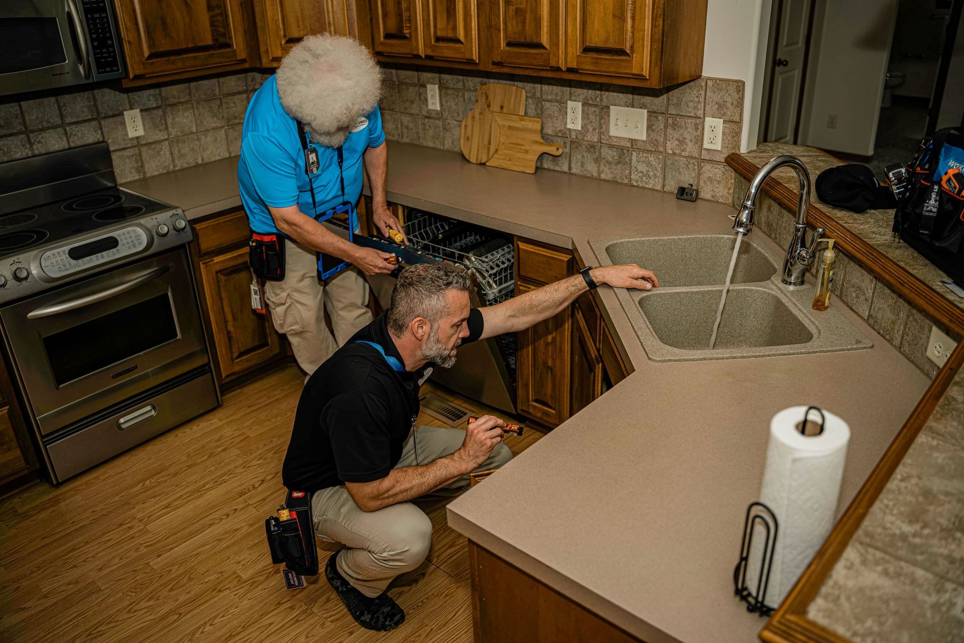People Inspecting the Kitchen Area — Wichita, KS — ICT Pro Inspections
