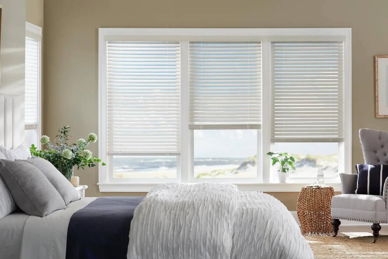 Stunning Alta Wood Blinds on several windows of a bedroom in a white paint finish