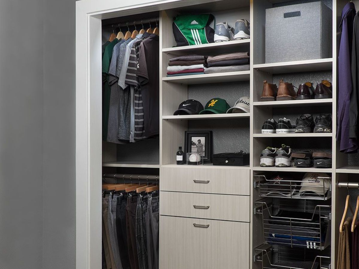 A closet filled with lots of clothes and shoes