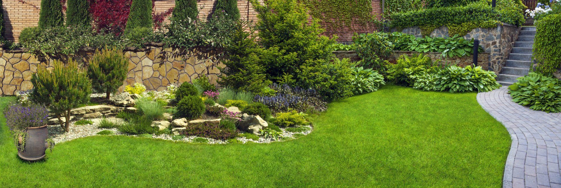 Garden Stone Path with Grass – Fall River, MA – Lion Lawn Care Enterprises LLC