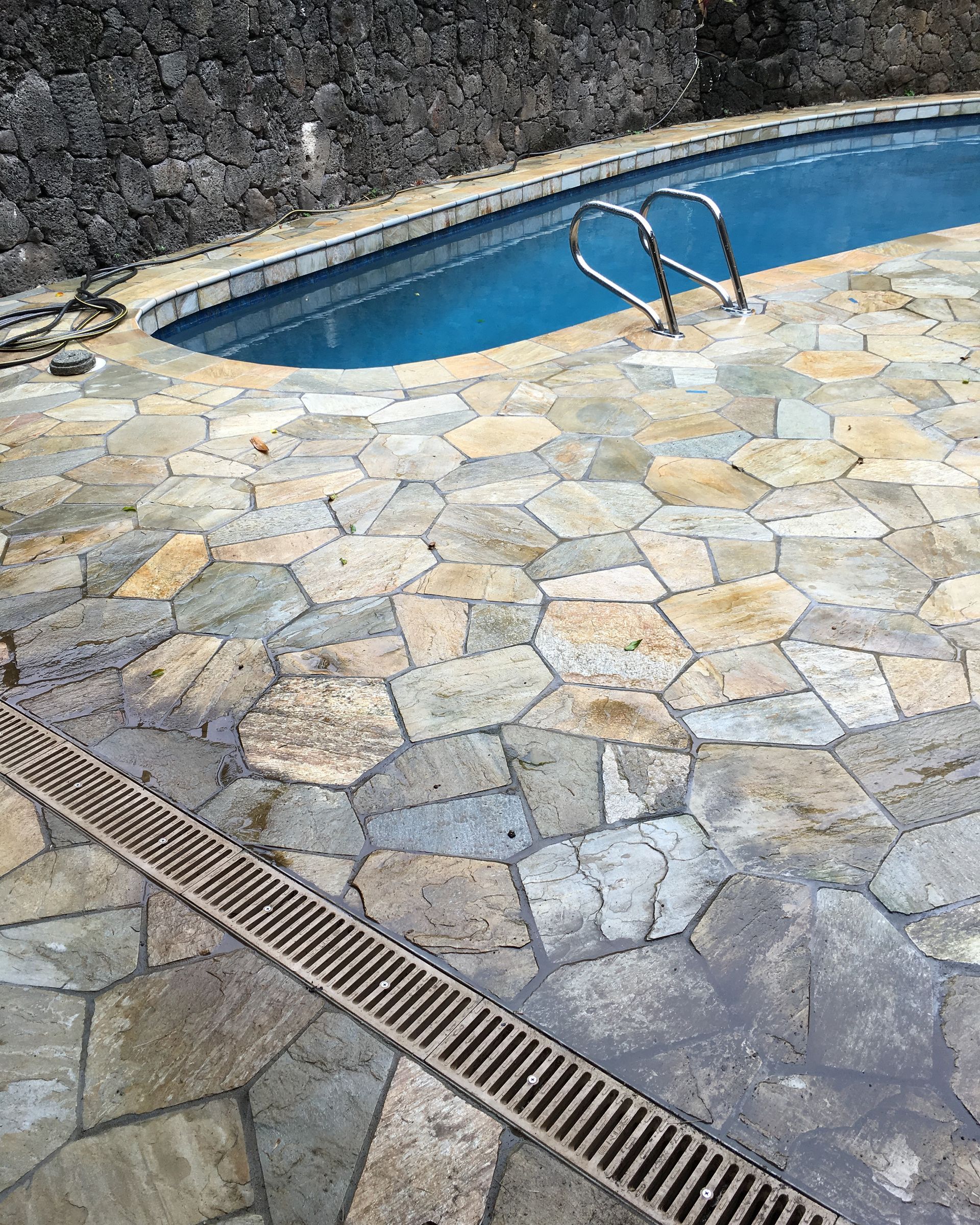 Swimming pool with stone patio,