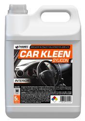 Envase blanco de 5 litros de limpiador de interiores de silicona CAR KLEEN con etiqueta negra y naranja.