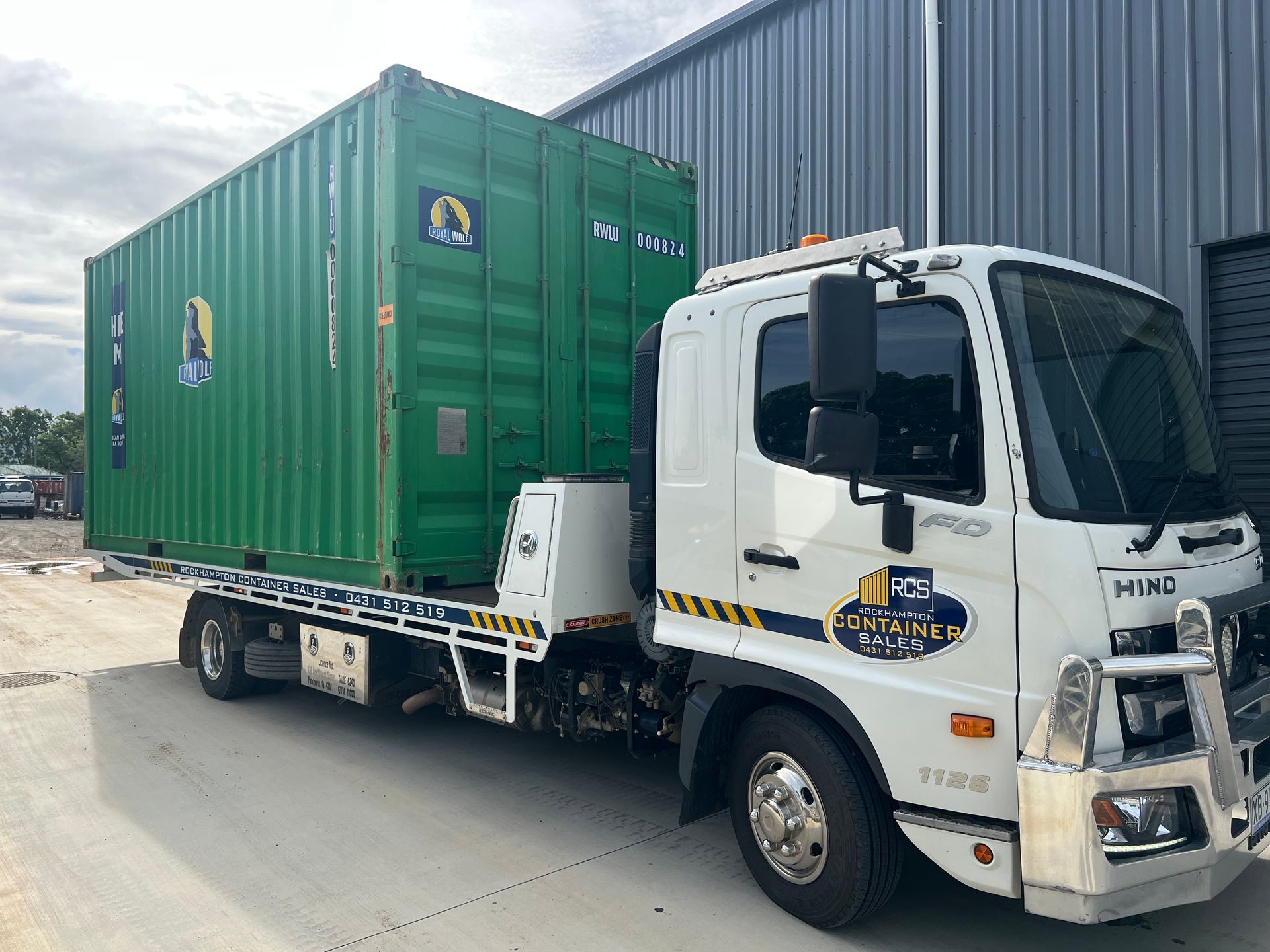 Empty, White Shipping Container Interior With Corrugated Walls and Dark Floor — Rockhampton Container Sales in Kawana, QLD