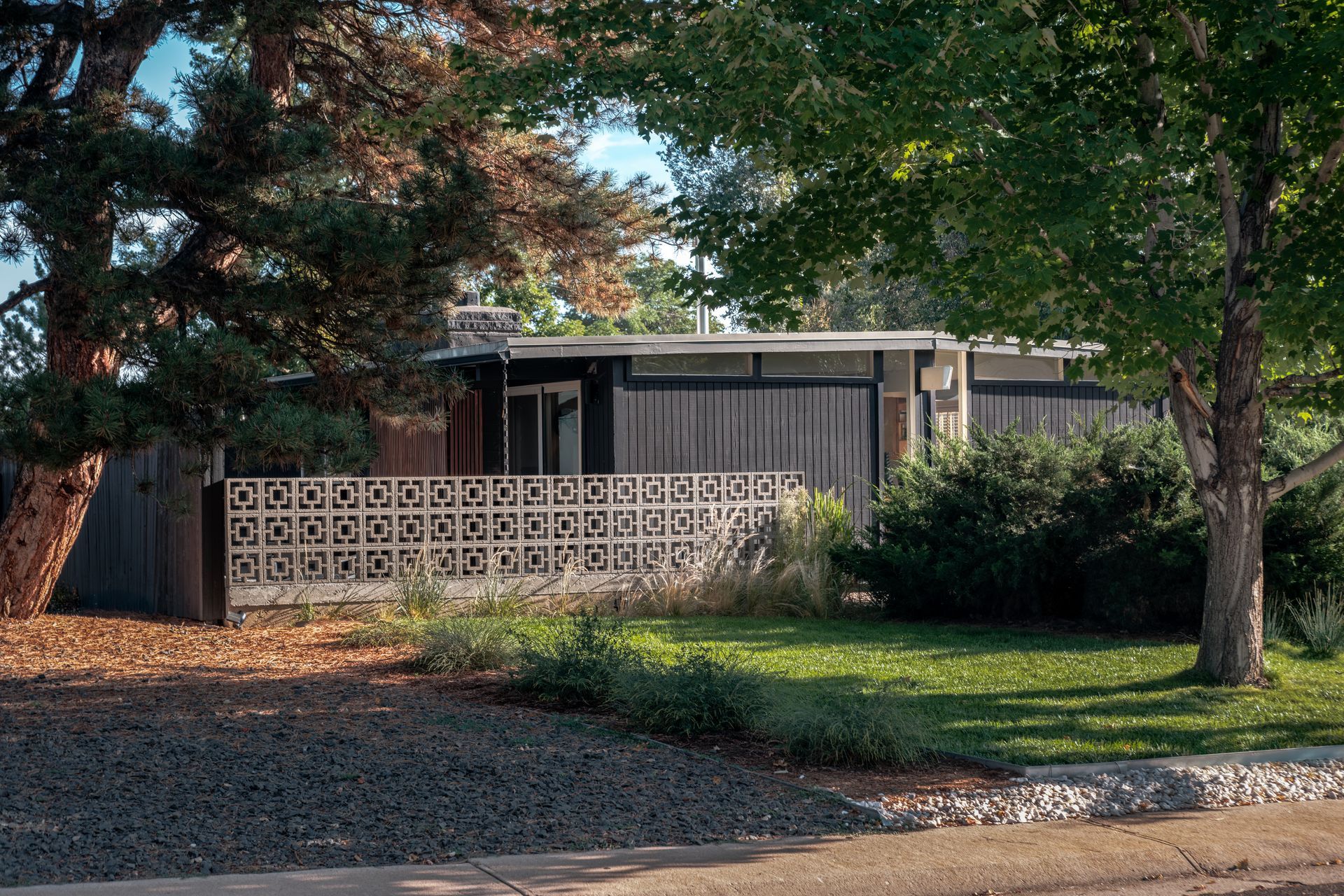 atomic ranch house with aspen trees