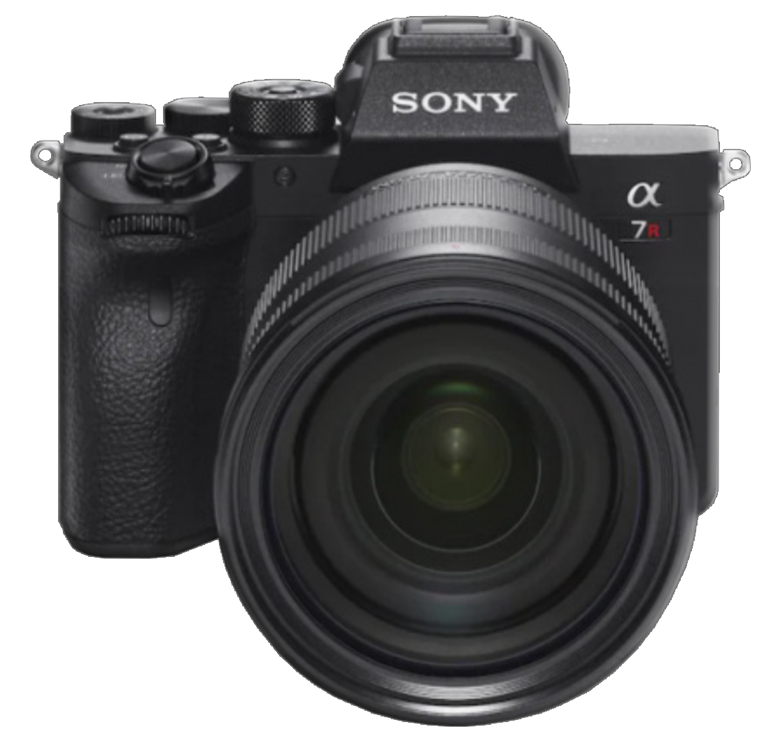 Una cámara Sony está colocada sobre una superficie blanca.