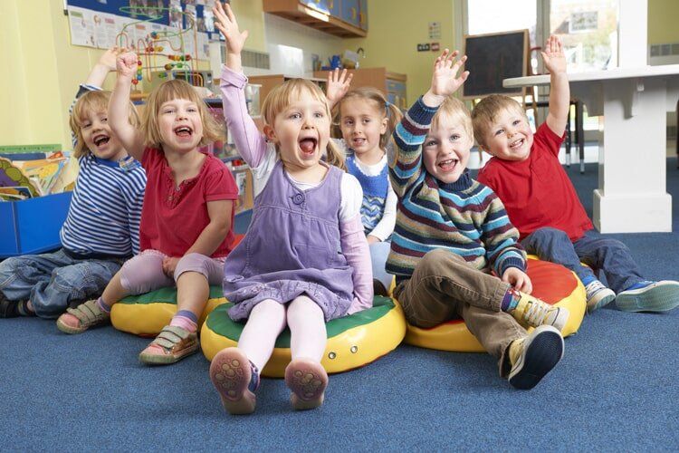 Students raising hands — Ross Circuit Preschool Centre Inc in Lavington, NSW Students raising hands — Ross Circuit Preschool Centre Inc in Lavington, NSW