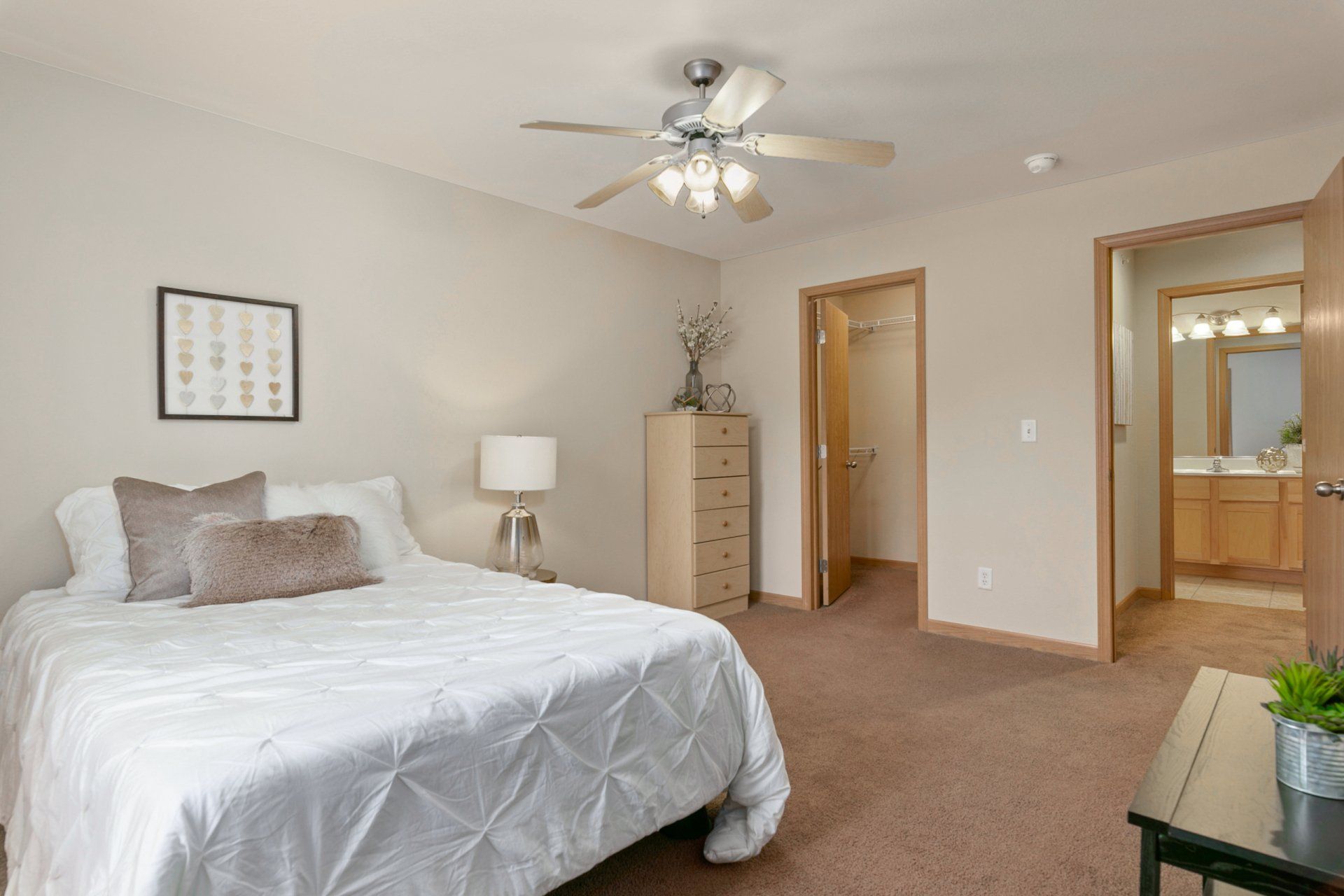 Fully furnished bedroom with walk-in closet