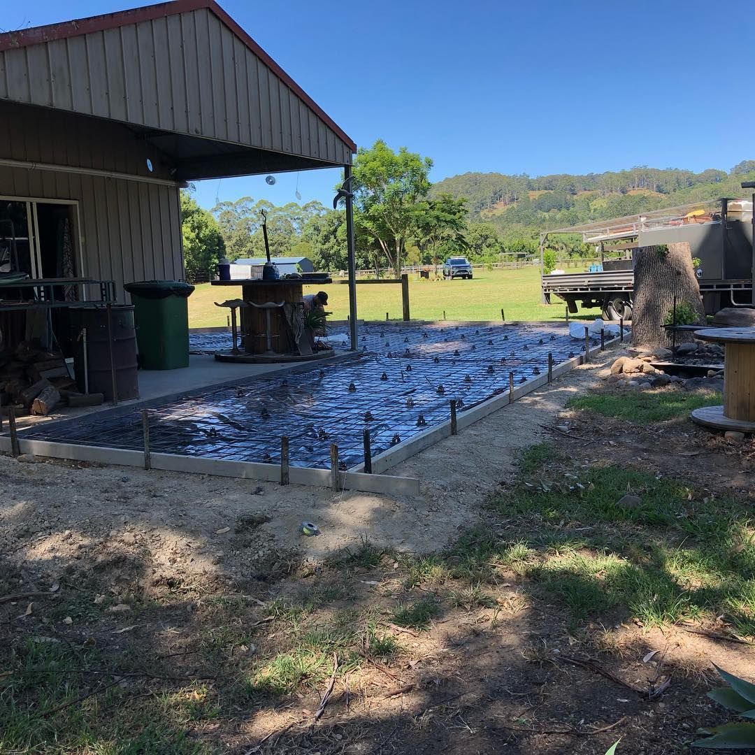 A Construction Site With a Freshly Laid Concrete Slab — Sand & Stone in Worongary, QLD