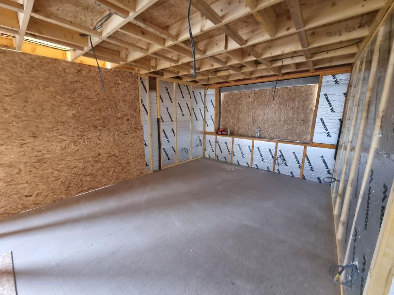 internal detached garage being insulated for more living space