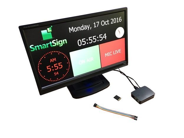 A smart sign monitor shows the time as 5:55 on monday 17 october 2016