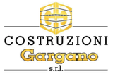 Logo per Costruzioni Gargano srl con emblema esagonale giallo e testo nero-oro su sfondo bianco