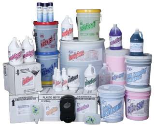 White Mountain Chemical Assorted cans and buckets stacked in a product display, with a black dispenser in front.