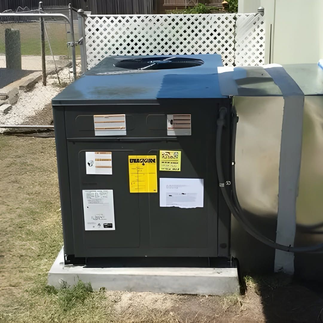 Outdoor HVAC service scene with a gray condenser unit, gauges, and tools on the ground