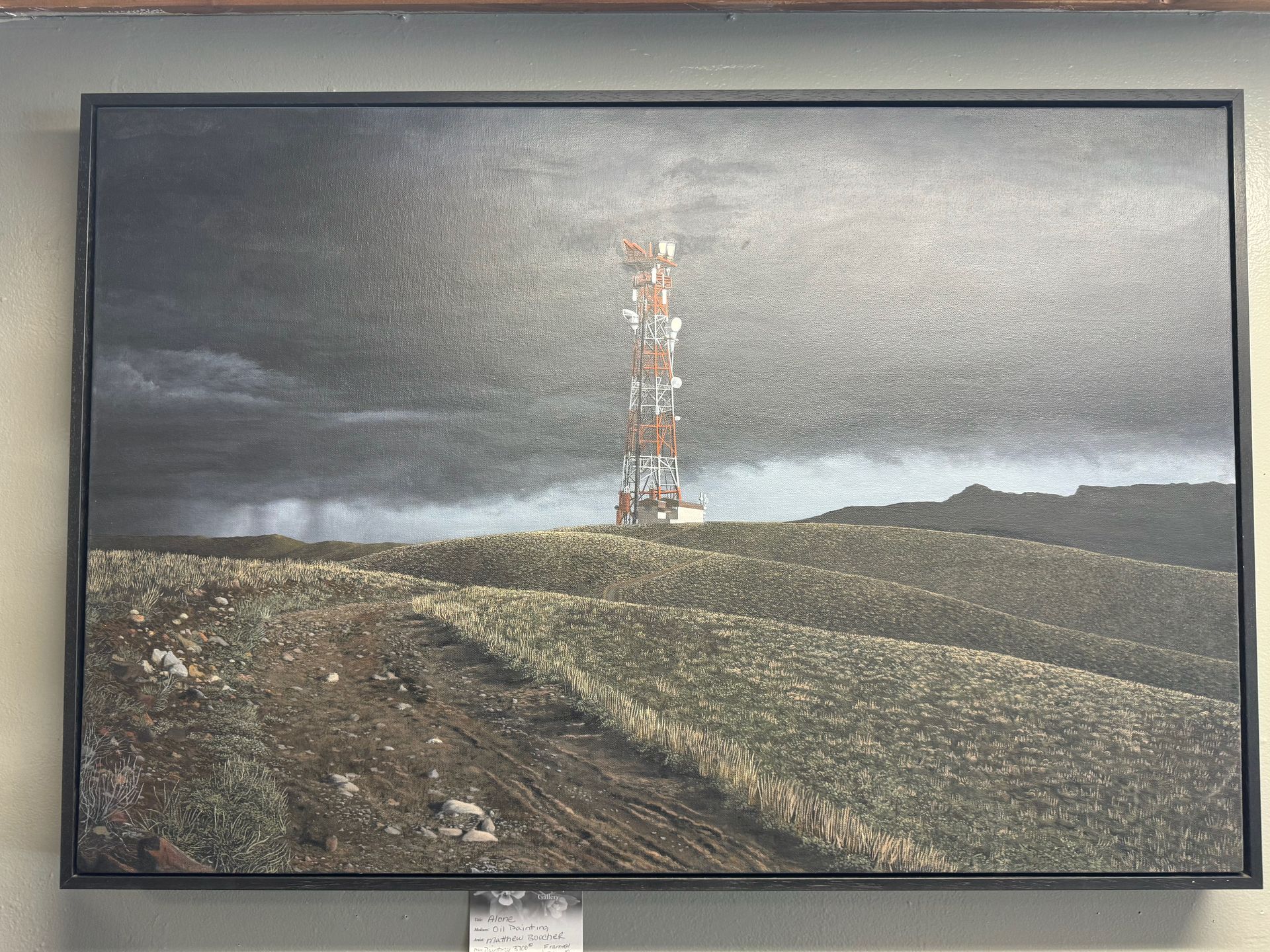 A painting of a tower in the middle of a field