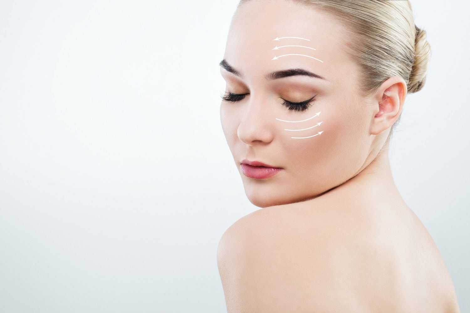 A close up of a woman 's face with lines on it.