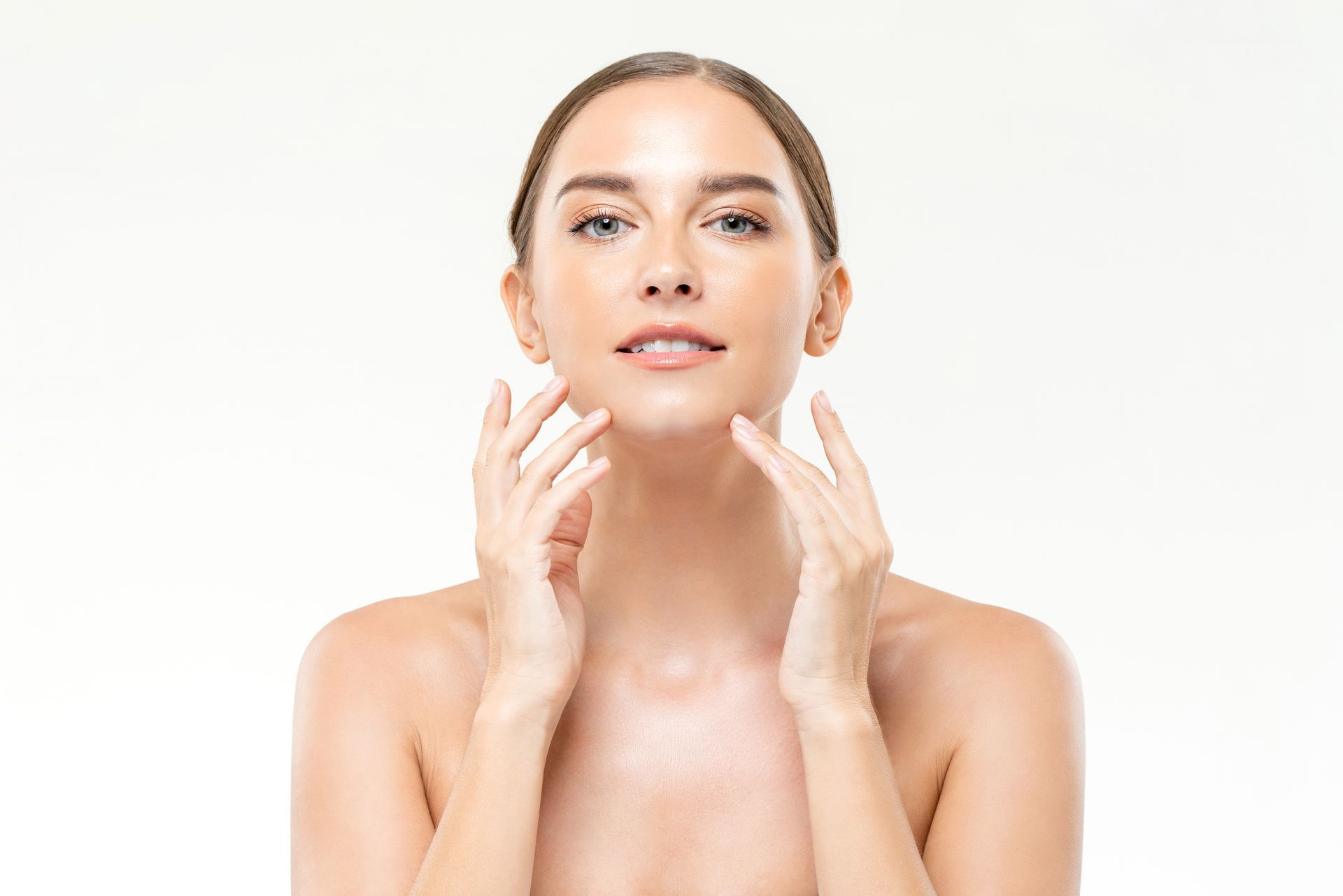 woman with glowing skin smiling