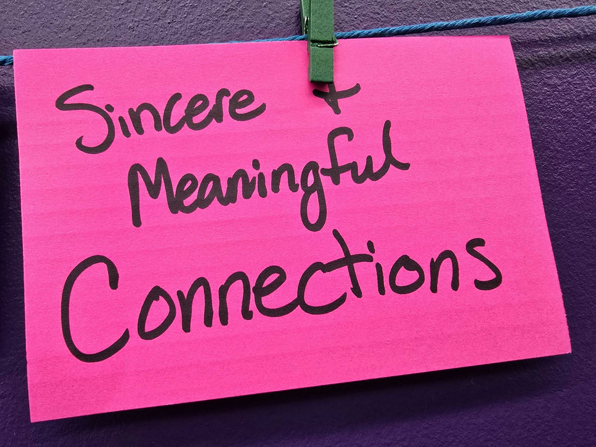 Pink sticky note with 