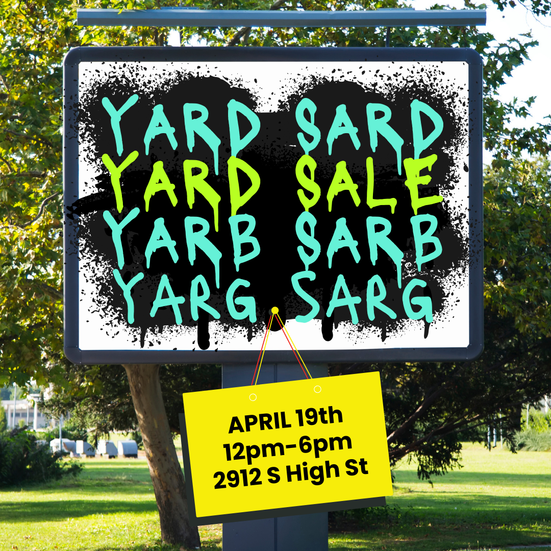Billboard advertising a yard sale.