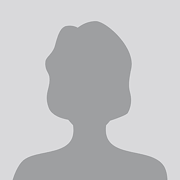 Silhouette of a person with short hair and shoulders, against a gray background.