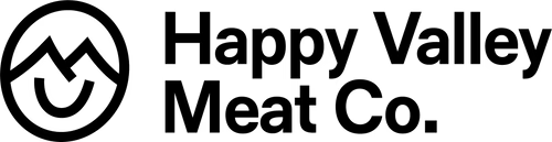 Happy Valley Meat Co. logo featuring a circular design with a mountain and smiling face, and company name.