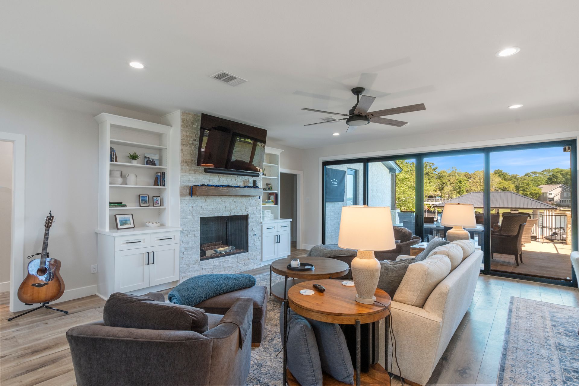 A living room filled with furniture and a fireplace.