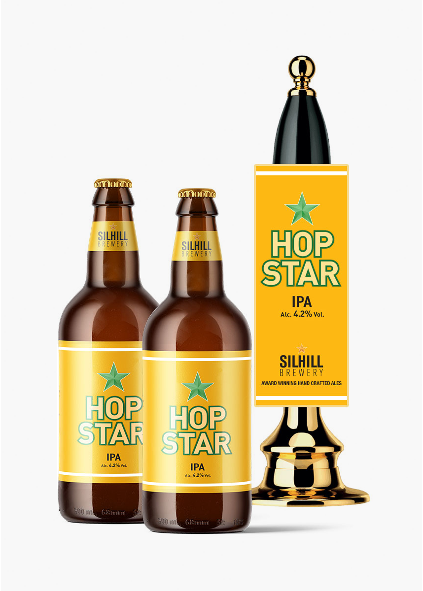 Two bottles of hop star beer next to a tap.