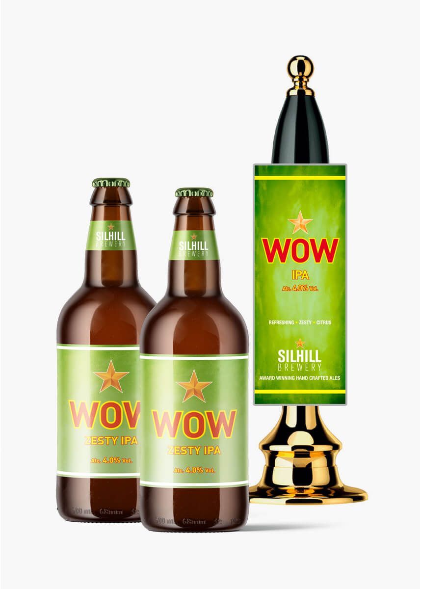 Three bottles of wow beer are sitting next to each other on a white background.