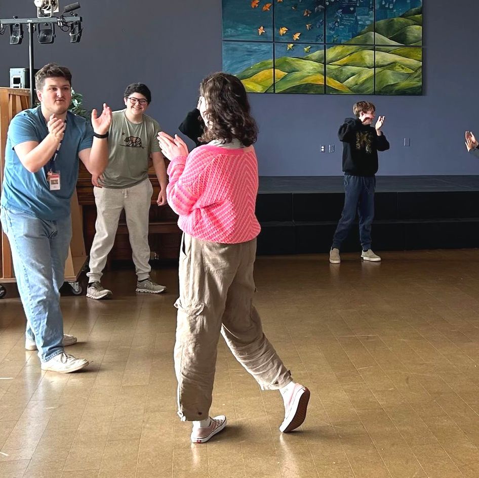An Acting Coach gives lessons to Middle School students in preparation of their Shakespeare performance.