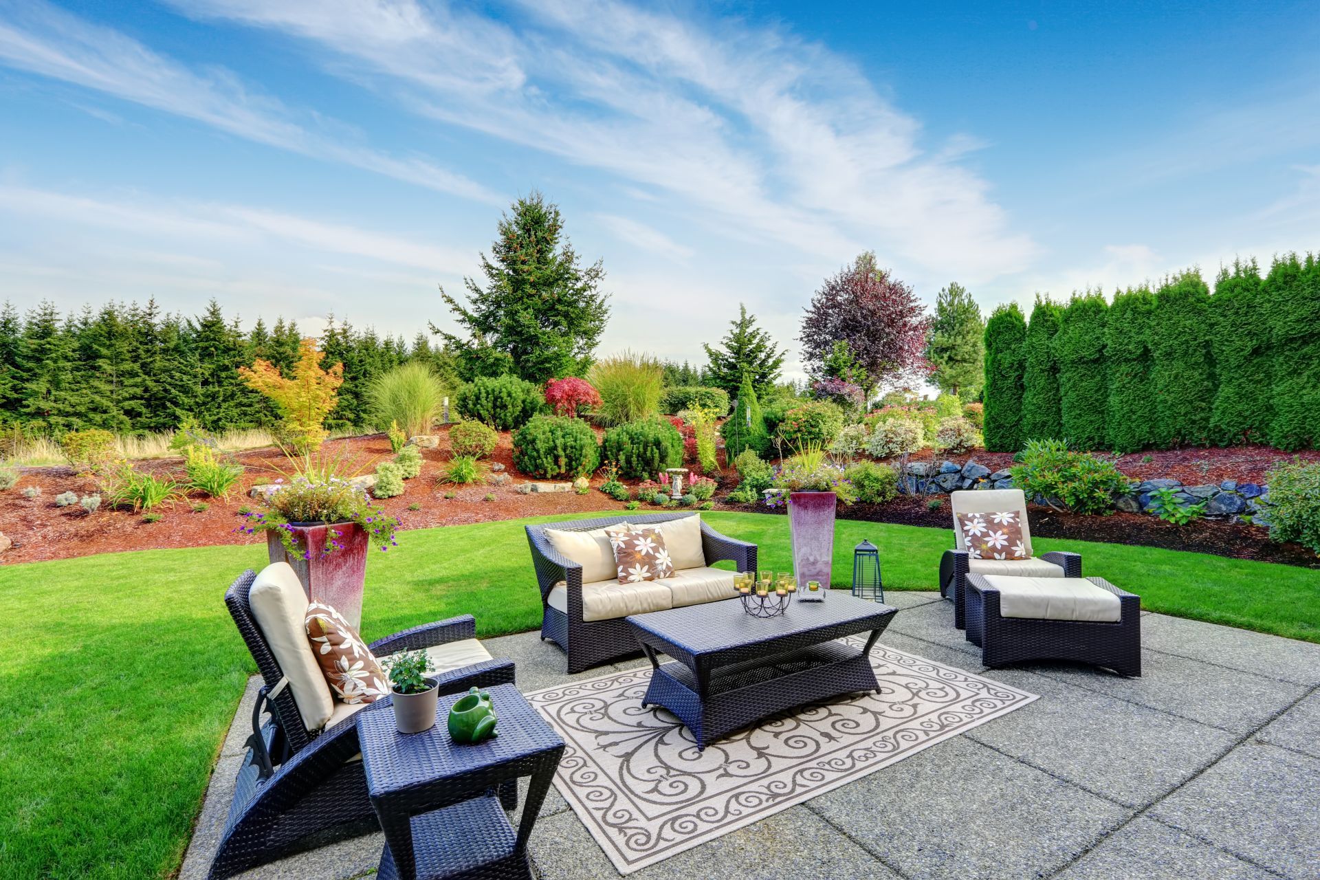 Elegant patio furniture on stylish Athens, GA garden terrace.