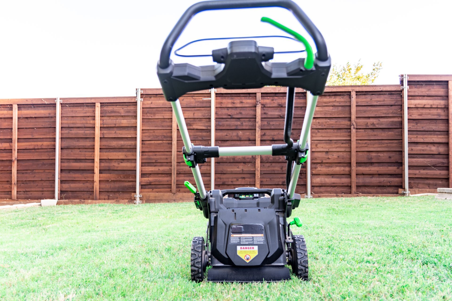 Eco-friendly battery lawn mower on Athens, GA lawn.