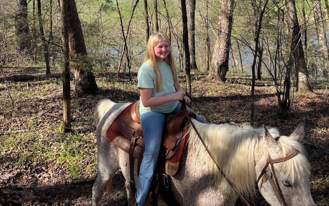 Horseback riding at River View Cabins in the Ouachita Mountains