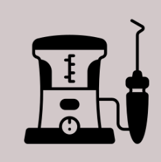 Black electric dental tool with cord on a light background, showing a hose and handpiece