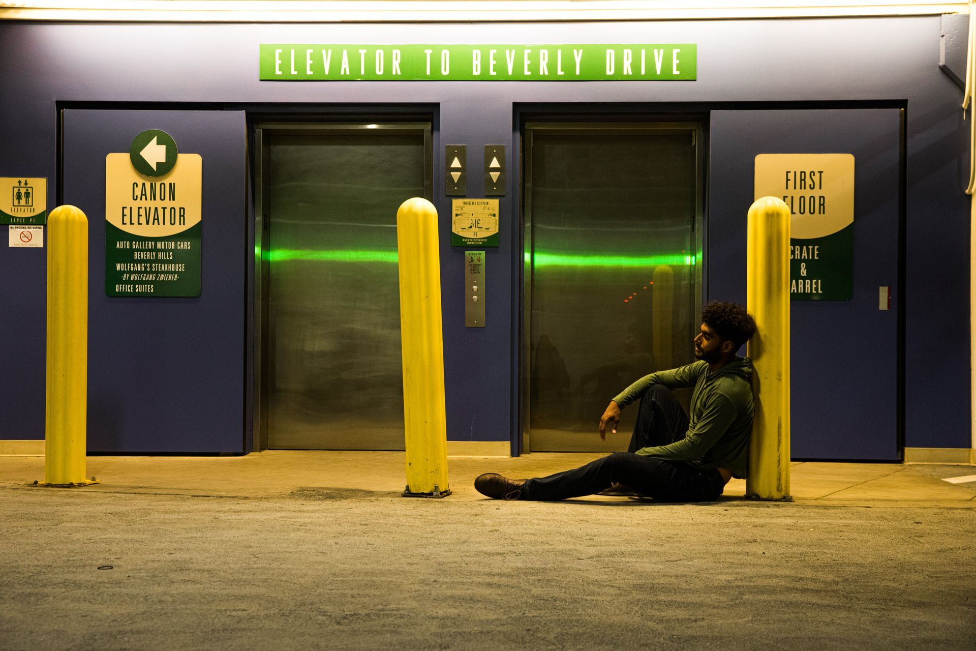 Movers is waiting elevator for moving furniture